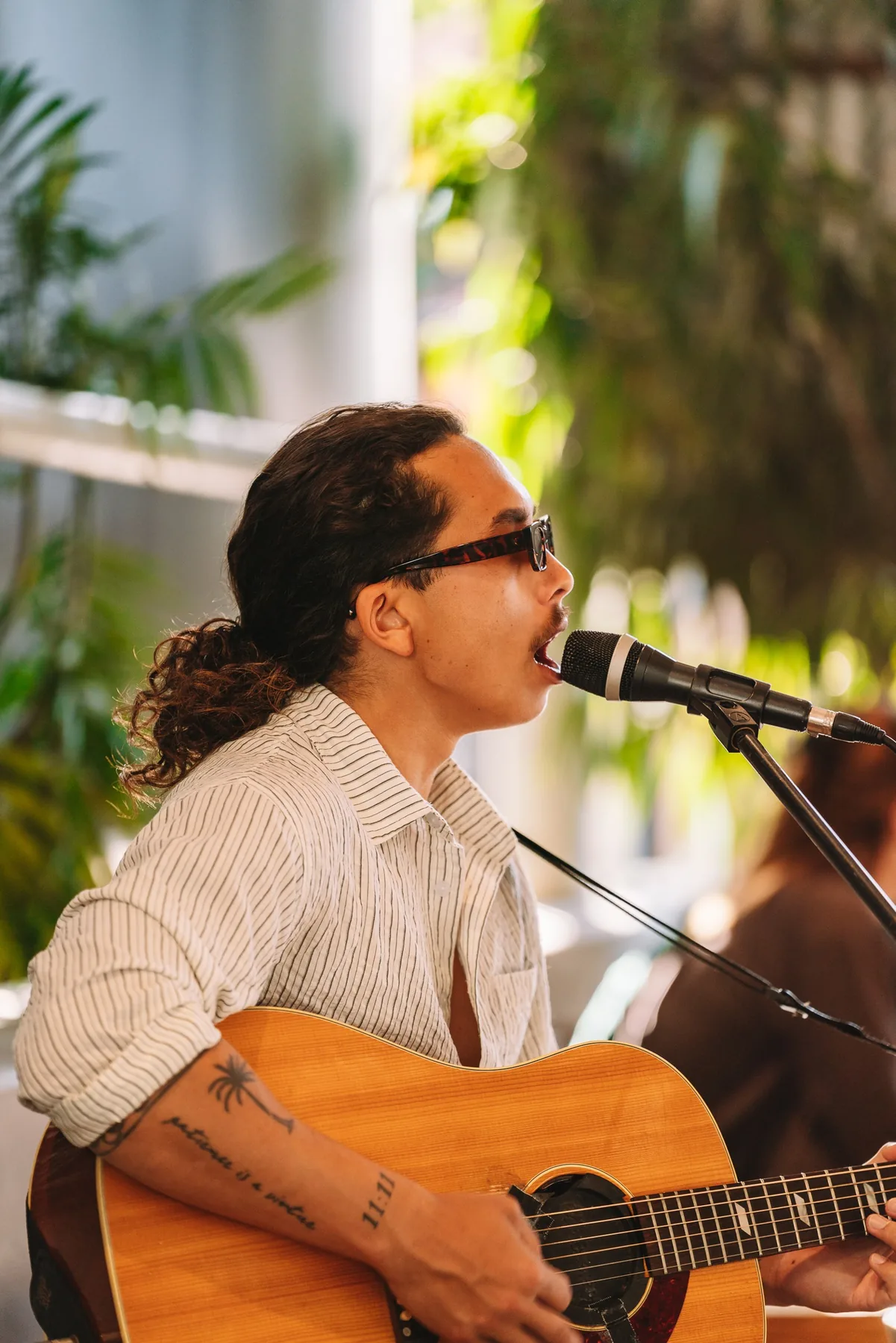 A musician playing to a room