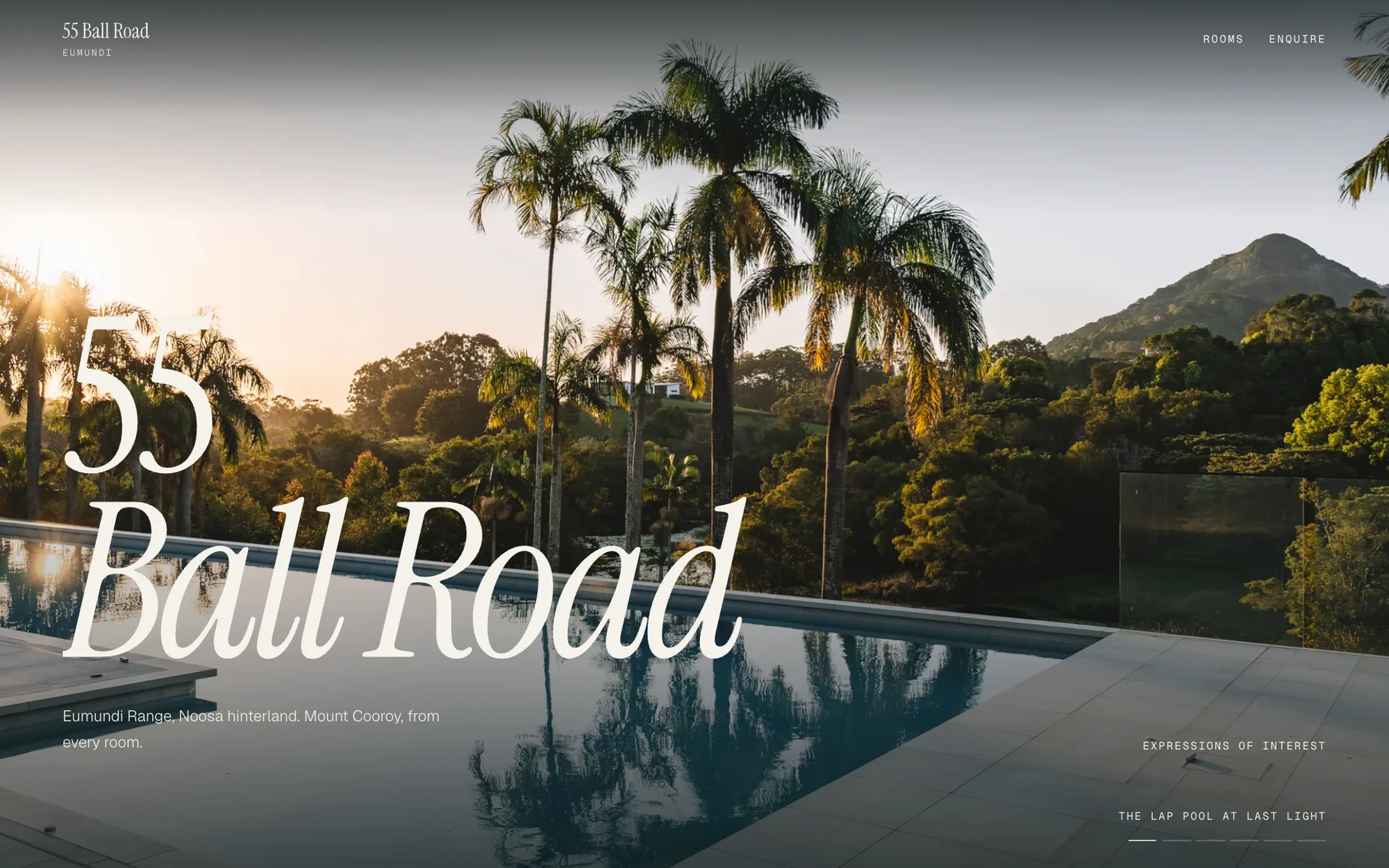 A listing website opening on a pool at last light, the street name across it